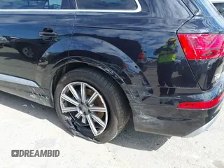 2017 Audi Q7 Prestige z VIN WA1VAAF70HD050053, wystawiony jako IAAI lot #41614112 z przebiegiem 73 892 mil mil oraz . Historia ofert i sprzedaży dostępna na DreamBid. Obrazek 6.