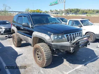 2000 Jeep Grand Cherokee Laredo with VIN 1J4GW48N0YC204645, listed as a IAAI auction lot 42650659 with 217,851 mi miles and . Bid and sale history available at DreamBid. Image 1.