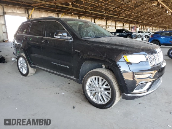 2018 Jeep Grand Cherokee Summit with VIN 1C4RJFJT4JC344141, listed as a Copart auction lot 57123685 with 86,893 mi miles and Salvage title. Bid and sale history available at DreamBid. Image 4.