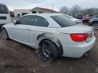 2011 BMW 3 Series 335i with VIN WBADX7C51BE742780, listed as a IAAI auction lot 41636961 with Not Provided miles and . Bid and sale history available at carsss.com. Image 3.