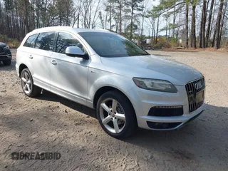 2015 Audi Q7 3.0T S line Prestige with VIN WA1DGAFE9FD001990, listed as a IAAI auction lot 41704132 with 108,118 mi miles. Bid and sale history available at carsss.com. Image 1.