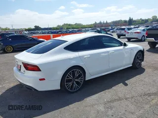 2016 Audi A7 Prestige with VIN WAU2GAFC1GN158272, listed as a IAAI auction lot 42012170 with 99,775 mi miles and . Bid and sale history available at DreamBid. Image 4.
