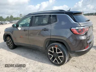 2018 Jeep Compass Limited with VIN 3C4NJDCB9JT206736, listed as a Copart auction lot 59838055 with 124,992 mi miles and Salvage title. Bid and sale history available at DreamBid. Image 2.