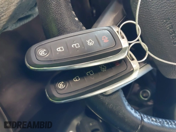 2019 Ford Escape Titanium with VIN 1FMCU9J97KUC55772, listed as a IAAI auction lot 42514001 with 77,737 mi miles and . Bid and sale history available at DreamBid. Image 11.