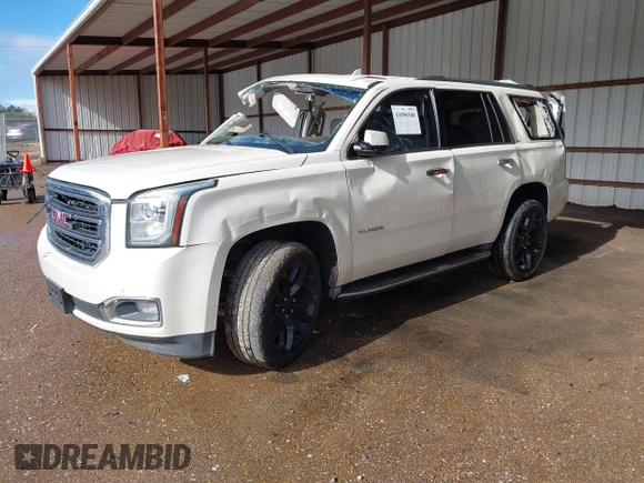 2015 GMC Yukon SLT with VIN 1GKS2BKC6FR612606, listed as a IAAI auction lot 41096580 with Not Provided miles and . Bid and sale history available at DreamBid. Image 18.