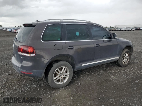 2008 Volkswagen Touareg V6 z VIN WVGBE77LX8D000610, wystawiony jako Copart lot #58434065 z przebiegiem 208 718 mil mil oraz Czysty tytuł • Clean title. Historia ofert i sprzedaży dostępna na DreamBid. Obrazek 3.