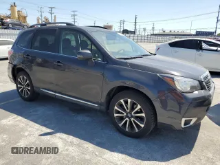 2017 Subaru Forester Touring with VIN JF2SJGWC1HH476823, listed as a Copart auction lot 59230835 with 107,711 mi miles and Salvage title. Bid and sale history available at DreamBid. Image 4.