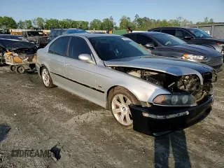 1999 BMW 5 Series 540i z VIN WBADN5339XGC91489, wystawiony jako Copart lot #52009545 z przebiegiem 229 003 mil mil oraz Szkoda całkowita • Salvage title. Historia ofert i sprzedaży dostępna na DreamBid. Obrazek 11.