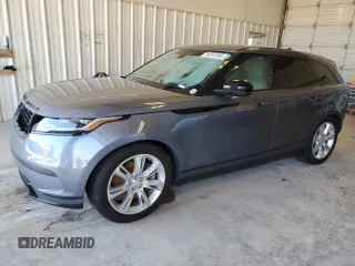 2021 Land Rover Range Rover Velar z VIN SALYJ2EU0MA306468, wystawiony jako Copart lot #56241045 z przebiegiem Nie podano mil oraz Szkoda całkowita • Salvage title. Historia ofert i sprzedaży dostępna na DreamBid. Obrazek 1.