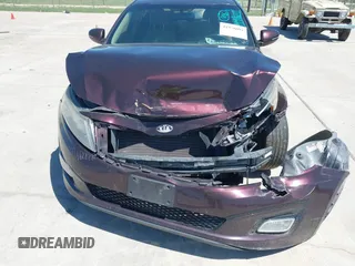 2014 Kia Optima LX with VIN 5XXGM4A77EG274839, listed as a IAAI auction lot 41976091 with 130,517 mi miles. Bid and sale history available at carsss.com. Image 12.