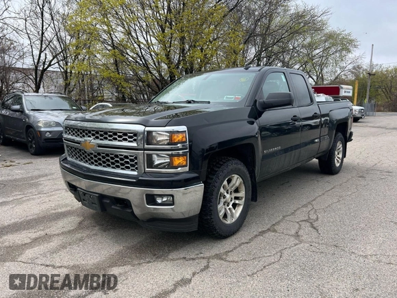 2014 Chevrolet Silverado 1500 LT with VIN 1GCVKREH1EZ169899, listed as a IAAI auction lot 42143501 with 124,789 mi miles and . Bid and sale history available at DreamBid. Image 2.