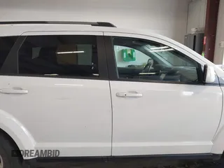2018 Dodge Journey SXT with VIN 3C4PDDBGXJT469945, listed as a IAAI auction lot 42266310 with 121,871 mi miles and . Bid and sale history available at DreamBid. Image 13.