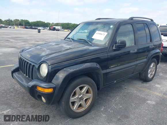 2003 Jeep Liberty Limited with VIN 1J4GK58K13W719457, listed as a IAAI auction lot 42088672 with 179,214 mi miles and . Bid and sale history available at carsss.com. Image 2.