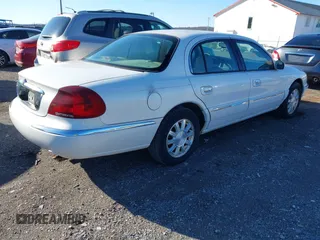 2002 Lincoln Continental with VIN 1LNHM97V92Y678663, listed as a IAAI auction lot 41777625 with 173,329 mi miles and . Bid and sale history available at DreamBid. Image 4.