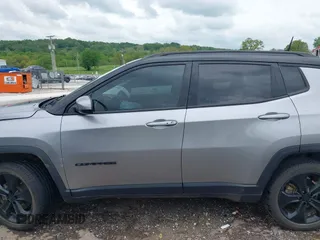 2018 Jeep Compass Latitude with VIN 3C4NJDBB8JT323967, listed as a IAAI auction lot 42096644 with 143,761 mi miles and . Bid and sale history available at DreamBid. Image 14.