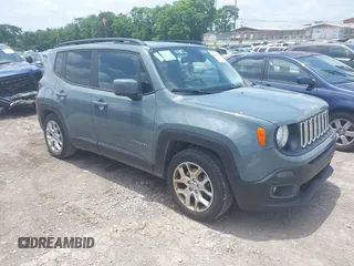 2017 Jeep Renegade Latitude z VIN ZACCJABB4HPF76064, wystawiony jako IAAI lot #42525583 z przebiegiem 115 970 mil mil oraz . Historia ofert i sprzedaży dostępna na DreamBid. Obrazek 1.