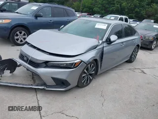 2023 Honda Civic EX with VIN 2HGFE1F77PH321210, listed as a IAAI auction lot 42379950 with Not provided miles and . Bid and sale history available at DreamBid. Image 2.