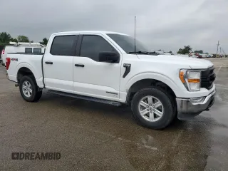 2022 Ford F-150 XL with VIN 1FTFW1ED6NFA64624, listed as a Copart auction lot 61998585 with 159,091 mi miles and Clean title. Bid and sale history available at DreamBid. Image 4.
