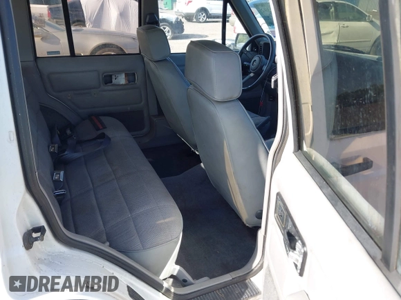1994 Jeep Cherokee Sport with VIN 1J4FT68S7RL160652, listed as a IAAI auction lot 41992392 with 158,122 mi miles and . Bid and sale history available at DreamBid. Image 8.