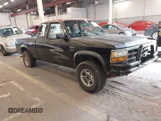 1993 Dodge Dakota z VIN 1B7GG23XXPS146273, wystawiony jako IAAI lot #42115602 z przebiegiem 222 740 mil mil oraz . Historia ofert i sprzedaży dostępna na DreamBid. Obrazek 1.