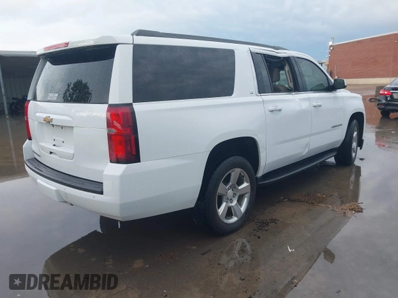 2018 Chevrolet Suburban LT with VIN 1GNSCHKC2JR376239, listed as a IAAI auction lot 42110551 with 123,694 mi miles and . Bid and sale history available at DreamBid. Image 4.