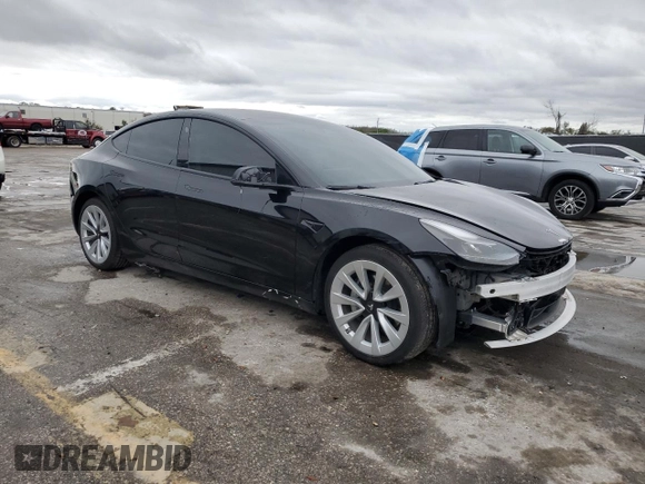 2022 Tesla Model 3 with VIN 5YJ3E1EA0NF186296, listed as a Copart auction lot 45711405 with 75,653 mi miles and Salvage Title. Bid and sale history available at DreamBid. Image 4.