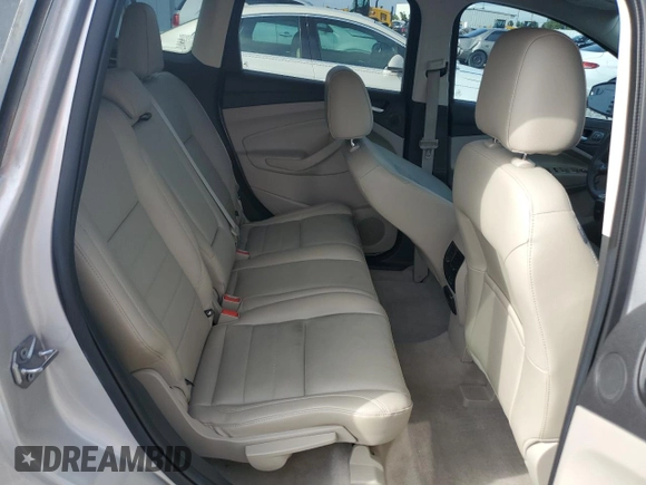 2015 Ford Escape Titanium z VIN 1FMCU0J97FUA14845, wystawiony jako Copart lot #58911445 z przebiegiem 110 437 mil mil oraz Szkoda całkowita • Salvage title. Historia ofert i sprzedaży dostępna na DreamBid. Obrazek 11.