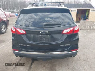 2018 Chevrolet Equinox Premier with VIN 2GNAXWEX6J6302935, listed as a IAAI auction lot 42065883 with 61,983 mi miles and . Bid and sale history available at carsss.com. Image 16.