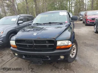 2002 Dodge Dakota Sport with VIN 1B7GL32X12S561414, listed as a IAAI auction lot 42060300 with 235,957 mi miles. Bid and sale history available at carsss.com. Image 12.