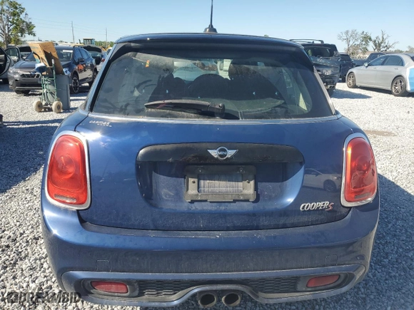 2016 MINI Cooper Hardtop 4 Door S with VIN WMWXU3C55G2D29125, listed as a Copart auction lot 50220615 with 58,681 mi miles and Salvage Title. Bid and sale history available at carsss.com. Image 6.