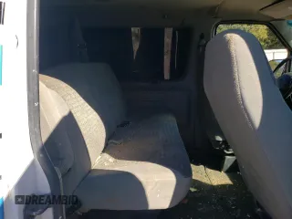 1997 Ford Econoline Wagon XL z VIN 1FBJS31L7VHB87288, wystawiony jako Copart lot #74976854 z przebiegiem 93 368 mil mil oraz Szkody całkowita. Historia ofert i sprzedaży dostępna na DreamBid. Obrazek 11.