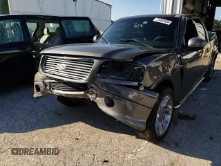 2002 Ford F-150 Harley Davidson with VIN 1FTRW07392KD46352, listed as a Copart auction lot 73463924 with 135,813 mi miles and Salvage Title. Bid and sale history available at carsss.com. Image 10.