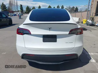 2023 Tesla Model Y Long Range with VIN 7SAYGDEE2PF696336, listed as a IAAI auction lot 41894686 with 34,203 mi miles. Bid and sale history available at carsss.com. Image 16.