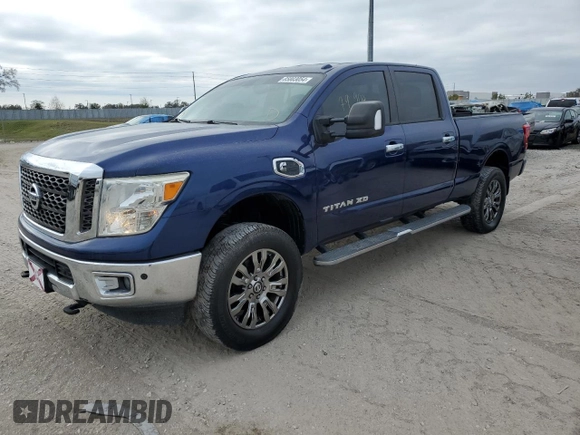 2017 Nissan Titan SL z VIN 1N6BA1F25HN514572, wystawiony jako Copart lot #85803054 z przebiegiem 79 904 mil mil oraz Czysty tytuł • Clean title. Historia ofert i sprzedaży dostępna na DreamBid. Obrazek 1.
