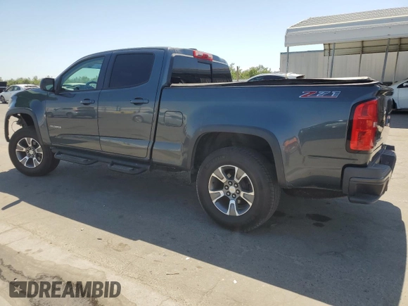 2015 Chevrolet Colorado 2WD Z71 with VIN 1GCGSCE39F1255925, listed as a Copart auction lot 63457735 with 119,801 mi miles and Salvage title. Bid and sale history available at DreamBid. Image 2.