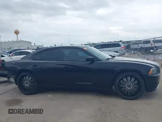 2014 Dodge Charger SE with VIN 2C3CDXBG8EH215850, listed as a IAAI auction lot 42077242 with 179,360 mi miles and . Bid and sale history available at carsss.com. Image 14.