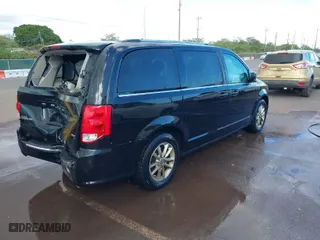 2020 Dodge Grand Caravan SXT with VIN 2C4RDGCG1LR248961, listed as a IAAI auction lot 41338107 with 105,027 mi miles. Bid and sale history available at carsss.com. Image 4.