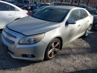 2013 Chevrolet Malibu LTZ with VIN 1G11J5SX0DF222834, listed as a IAAI auction lot 41628139 with 190,250 mi miles. Bid and sale history available at carsss.com. Image 2.
