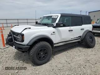 2022 Ford Bronco z VIN 1FMEE5DP4NLB67541, wystawiony jako Copart lot #58427485 z przebiegiem 67 774 mil mil oraz Szkoda całkowita • Salvage title. Historia ofert i sprzedaży dostępna na DreamBid. Obrazek 1.