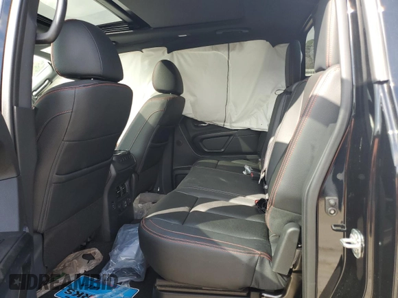 2024 Nissan Titan Pro-4X z VIN 1N6AA1ED3RN116454, wystawiony jako Copart lot #43611905 z przebiegiem 8 563 mil mil oraz Szkoda całkowita • Salvage title. Historia ofert i sprzedaży dostępna na DreamBid. Obrazek 10.