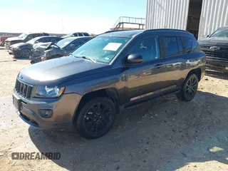 2014 Jeep Compass Sport with VIN 1C4NJCBA4ED880940, listed as a IAAI auction lot 41712357 with 156,171 mi miles. Bid and sale history available at carsss.com. Image 17.