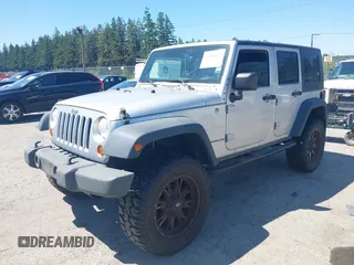 2008 Jeep Wrangler Unlimited X with VIN 1J4GA39148L596727, listed as a IAAI auction lot 42632457 with 175,000 mi miles and . Bid and sale history available at DreamBid. Image 17.