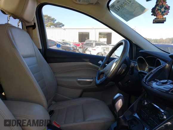 2014 Ford Escape Titanium with VIN 1FMCU9J94EUC50534, listed as a IAAI auction lot 41040341 with 115,502 mi miles. Bid and sale history available at carsss.com. Image 5.