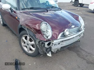 2003 MINI Hardtop with VIN WMWRC33493TC45557, listed as a IAAI auction lot 41868476 with 114,848 mi miles and . Bid and sale history available at DreamBid. Image 6.