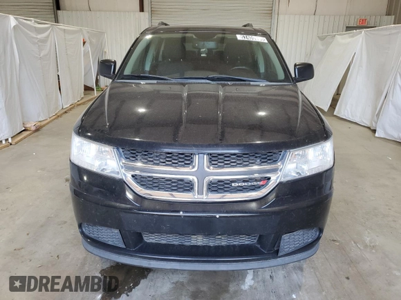 2017 Dodge Journey SE with VIN 3C4PDCABXHT506356, listed as a Copart auction lot 52409805 with 146,782 mi miles and Salvage Title. Bid and sale history available at DreamBid. Image 5.