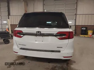 2021 Honda Odyssey Touring with VIN 5FNRL6H80MB026908, listed as a IAAI auction lot 41564765 with 116,453 mi miles. Bid and sale history available at carsss.com. Image 16.