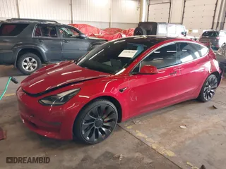 2021 Tesla Model 3 Performance with VIN 5YJ3E1EC5MF914582, listed as a IAAI auction lot 41098514 with 45,611 mi miles. Bid and sale history available at carsss.com. Image 18.
