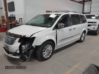 2014 Chrysler Town & Country Limited with VIN 2C4RC1GG7ER178802, listed as a IAAI auction lot 41863918 with 103,777 mi miles and . Bid and sale history available at DreamBid. Image 2.