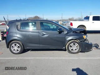 2014 Chevrolet Sonic LT with VIN 1G1JC6SH3E4203331, listed as a IAAI auction lot 41595915 with 161,876 mi miles. Bid and sale history available at carsss.com. Image 13.