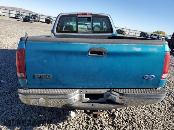 1997 Ford F-150 with VIN 1FTDX1725VKC16240, listed as a Copart auction lot 80091964 with 115,205 mi miles and Salvage title. Bid and sale history available at DreamBid. Image 6.